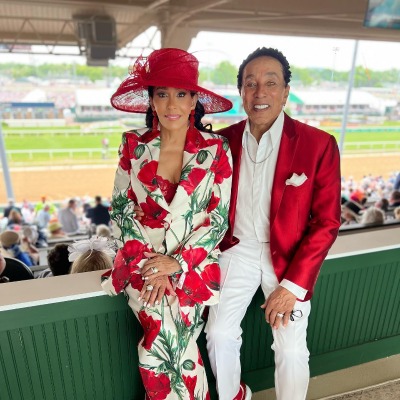 Frances Gladney with her spouse at Kentucky Derby.